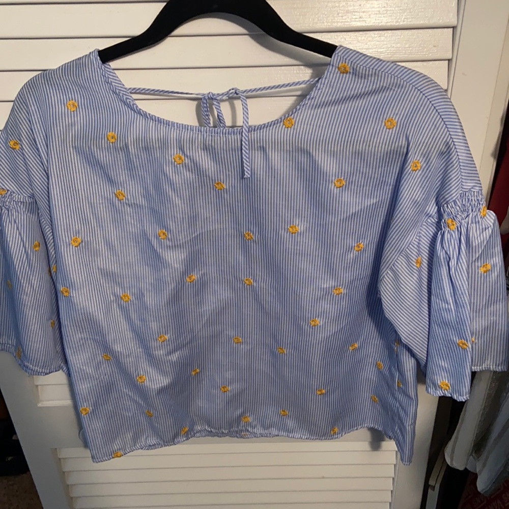 Blue and white striped and floral top. With 3/4 sleeves